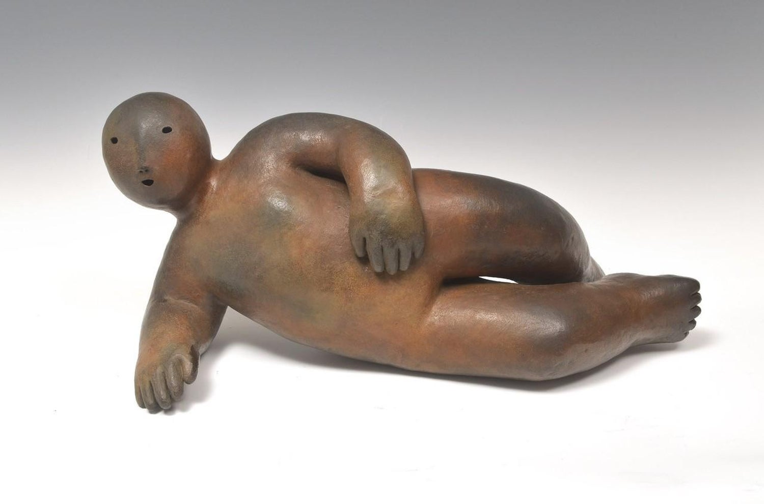 In the style of Henry Moore, Mother and Child in Rocking Chair