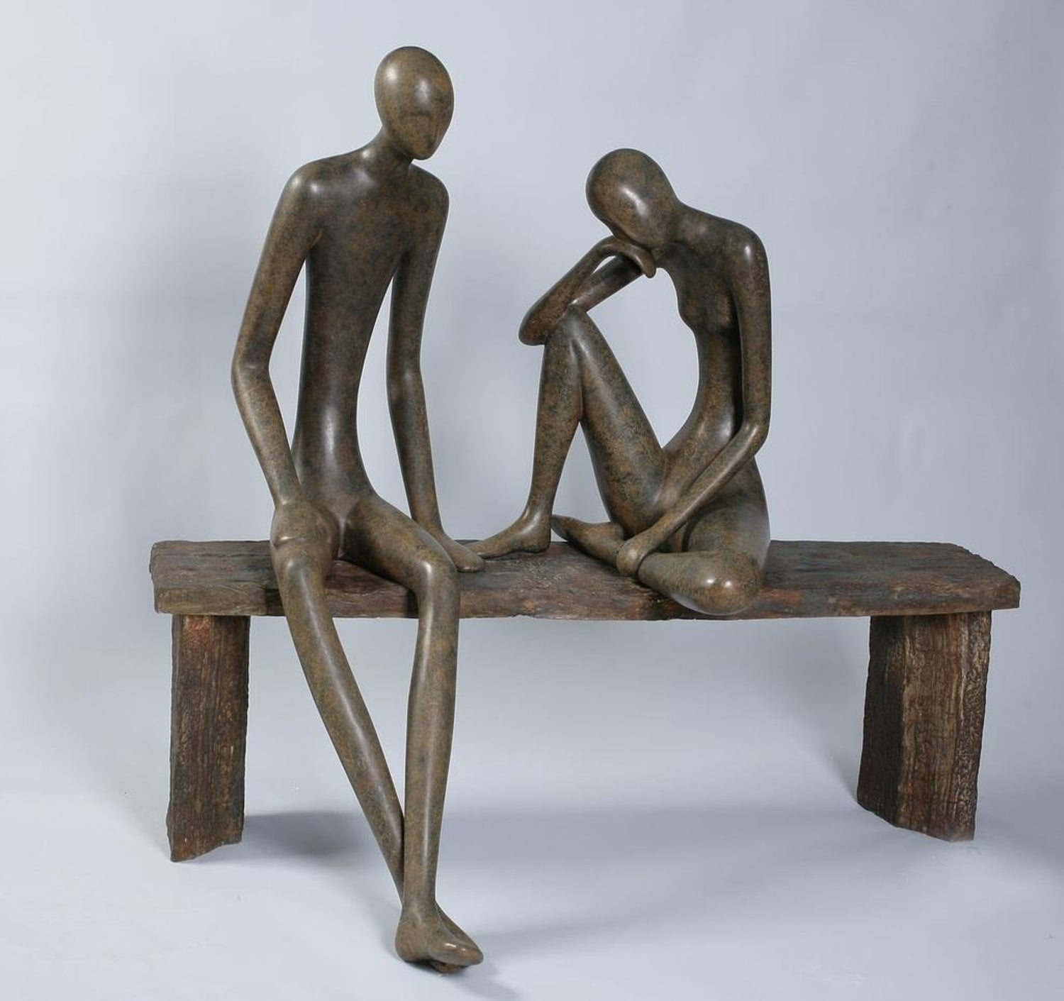 In the style of Henry Moore, Mother and Child in Rocking Chair