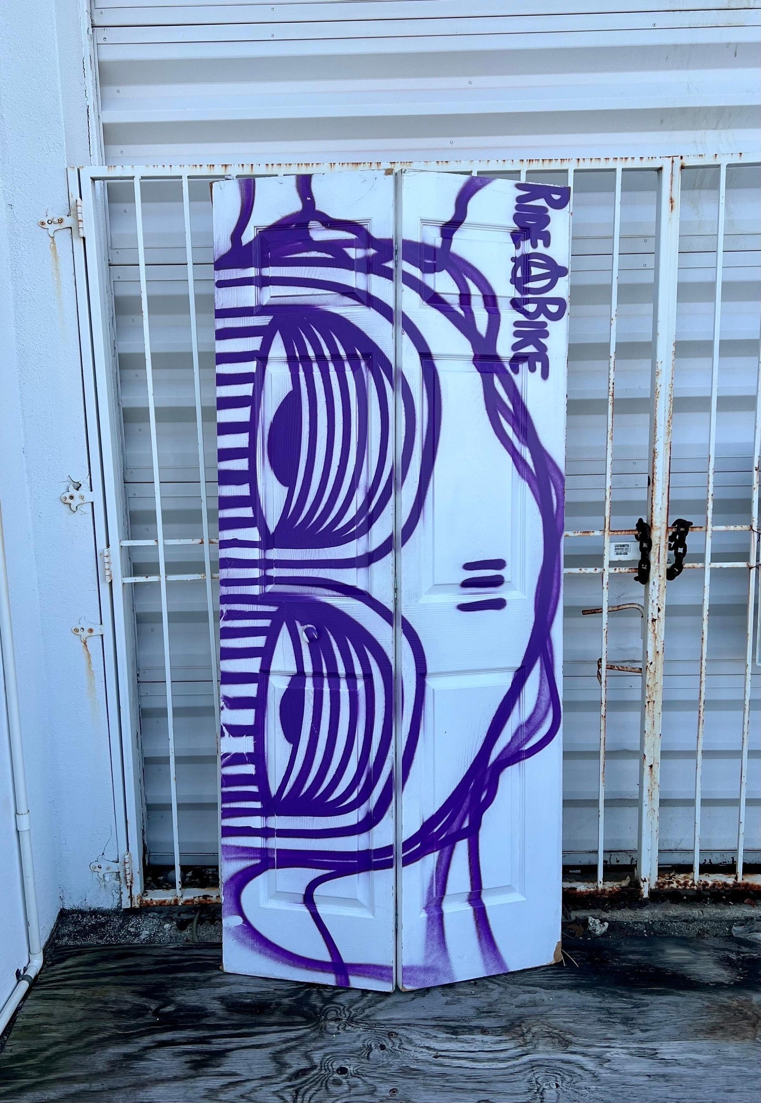 Miami Graffiti Legend Ahol Sniffs Glue Large Spray Painting on Doors Sculpture