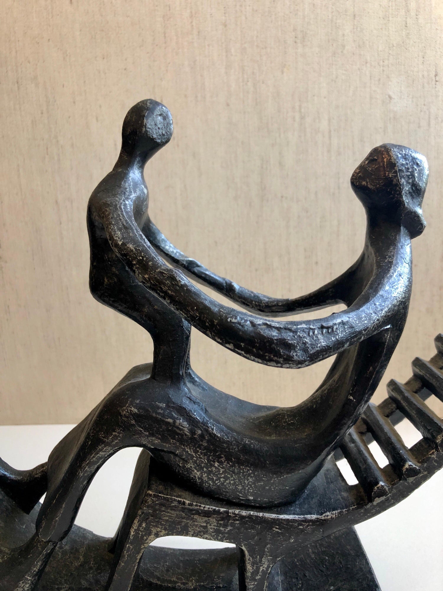 In the style of Henry Moore, Mother and Child in Rocking Chair