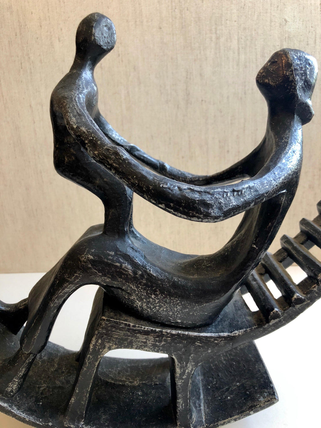 In the style of Henry Moore, Mother and Child in Rocking Chair