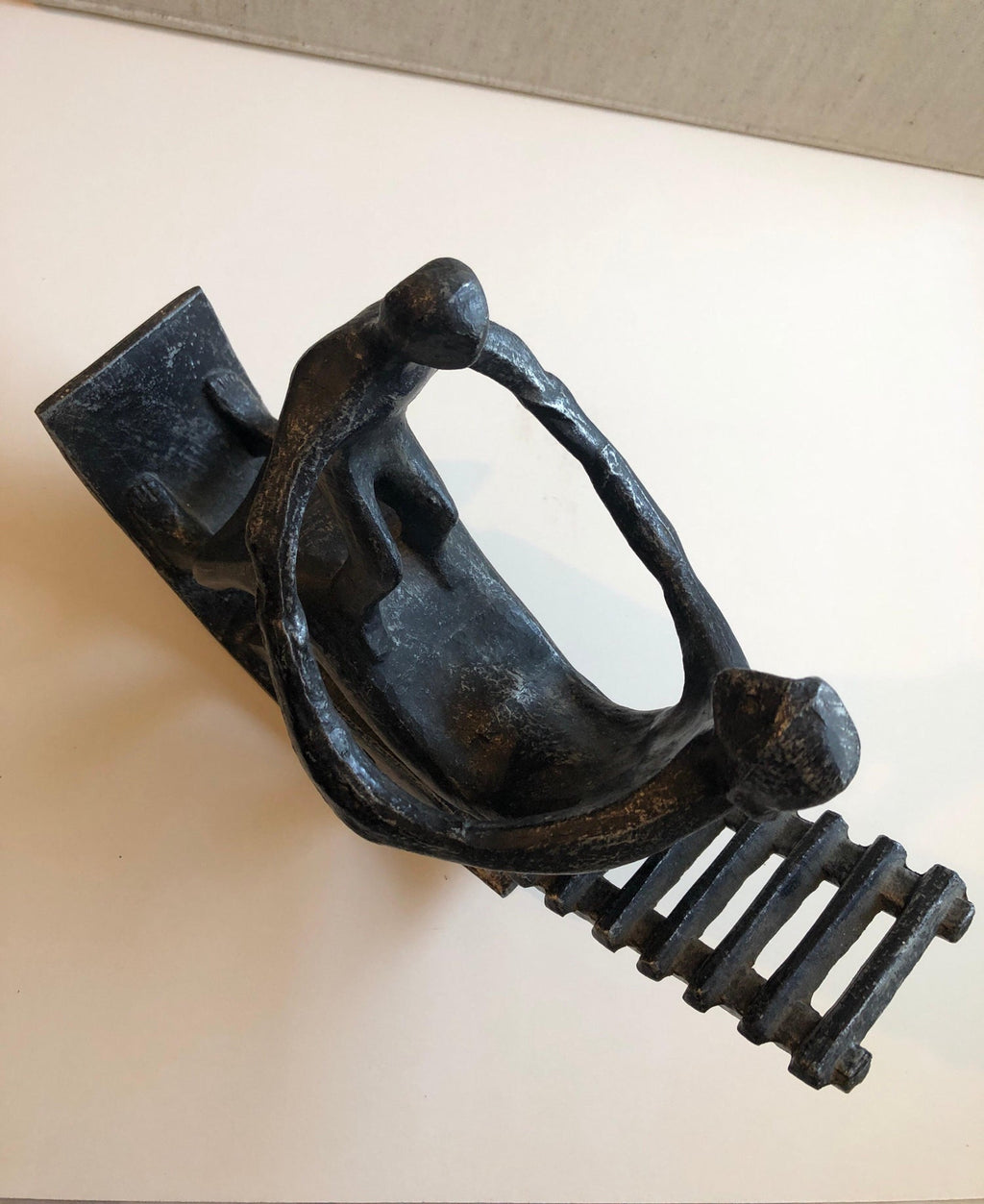 In the style of Henry Moore, Mother and Child in Rocking Chair