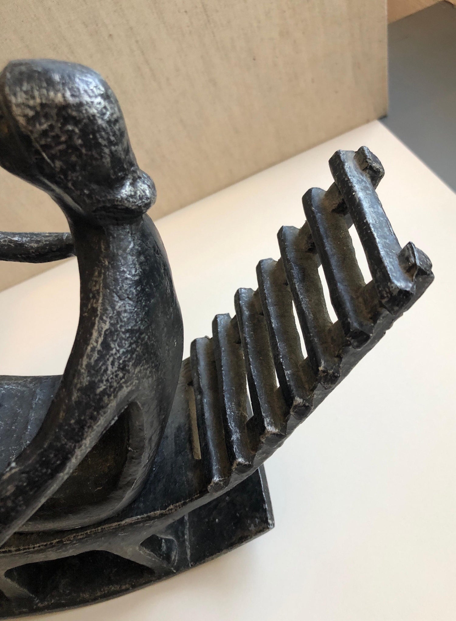 In the style of Henry Moore, Mother and Child in Rocking Chair